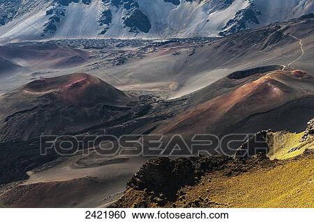 Stock Image - Colourful cinders catch the morning light; Maui, Hawaii, United States of America. Fotosearch