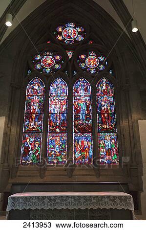 Stock Image - Colourful ornate stained glass window; Stavanger, Norway. Fotosearch