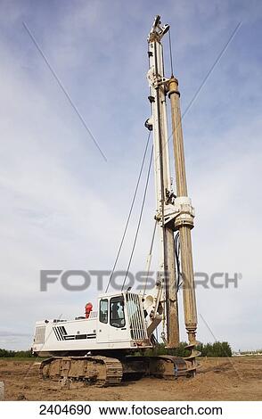 Construction project drilling pilings for warehouse development; Edmonton, Alberta, Canada View Large Photo Image Stock Image - Construction project drilling pilings for warehouse development; Edmonton, Alberta, Canada. Fotosearch