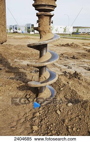 Construction project drilling pilings for warehouse development; Edmonton, Alberta, Canada View Large Photo Image Stock Photography - Construction project drilling pilings for warehouse development; Edmonton, Alberta, Canada. Fotosearch
