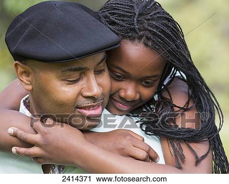 Daughter hugging her father; Edmonton, Alberta, Canada View Large Photo Image Stock Image - Daughter hugging her father; Edmonton, Alberta, Canada. Fotosearch