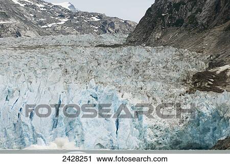 Dawes Glacier in Endicott Arm of Tracy Arm-Fords Terror Wilderness, a portion of the glacier calving visible; Alaska, United States of America View Large Photo Image Stock Image - Dawes Glacier in Endicott Arm of Tracy Arm-Fords Terror Wilderness, a portion of the glacier calving visible; Alaska, United States of America. Fotosearch