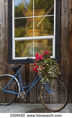 Decorative flowers and bikes adorn the True Grain Bakery on Vancouver Island; British Columbia, Canada View Large Photo Image Stock Image - Decorative flowers and bikes adorn the True Grain Bakery on Vancouver Island; British Columbia, Canada. Fotosearch