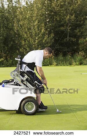 Disabled golfer in a tournament using high tech mobility aid; Edmonton, Alberta, Canada View Large Photo Image Stock Image - Disabled golfer in a tournament using high tech mobility aid; Edmonton, Alberta, Canada. Fotosearch