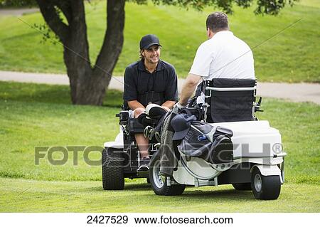 Disabled golfer in a tournament using high tech mobility aid; Edmonton, Alberta, Canada View Large Photo Image Stock Photo - Disabled golfer in a tournament using high tech mobility aid; Edmonton, Alberta, Canada. Fotosearch