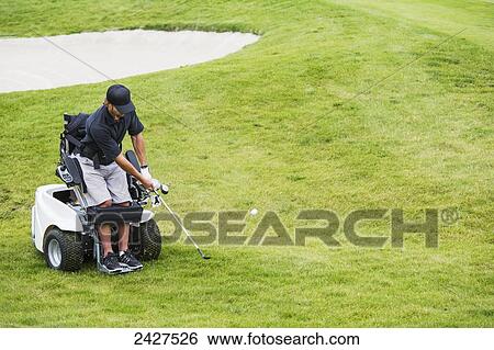 Disabled golfer in a tournament using high tech mobility aid; Edmonton, Alberta, Canada View Large Photo Image Stock Photograph - Disabled golfer in a tournament using high tech mobility aid; Edmonton, Alberta, Canada. Fotosearch