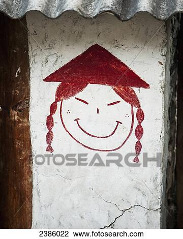 Drawing of a face with a conical hat on a bathroom wall; Tiger Leaping Gorge, Yunnan, China View Large Photo Image Stock Image - Drawing of a face with a conical hat on a bathroom wall; Tiger Leaping Gorge, Yunnan, China. Fotosearch