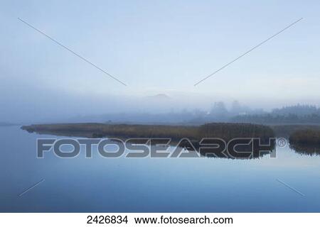 Early morning mist in Sneem Harbour; Sneem, County Kerry, Ireland View Large Photo Image Picture - Early morning mist in Sneem Harbour; Sneem, County Kerry, Ireland. Fotosearch