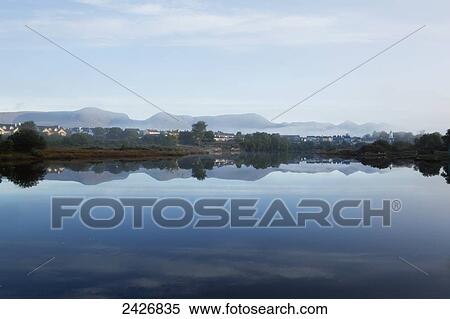 Early morning mist in Sneem Harbour; Sneem, County Kerry, Ireland View Large Photo Image Stock Photography - Early morning mist in Sneem Harbour; Sneem, County Kerry, Ireland. Fotosearch
