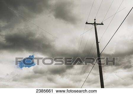 Electrical transmission lines and a cloudy sky; Peachland, British Columbia, Canada View Large Photo Image Stock Image - Electrical transmission lines and a cloudy sky; Peachland, British Columbia, Canada. Fotosearch