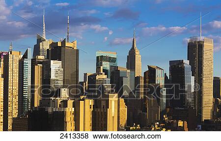Empire State Building and Midtown Skyscrapers, Manhattan; New York City, New York, United States of America View Large Photo Image Stock Photo - Empire State Building and Midtown Skyscrapers, Manhattan; New York City, New York, United States of America. Fotosearch