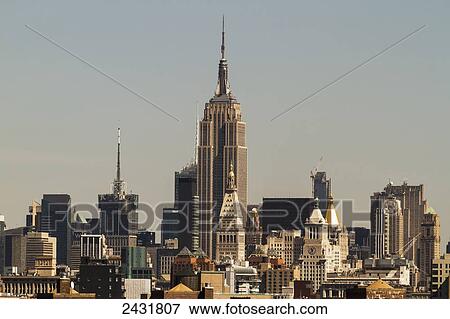 Stock Photo - Empire State Building, as seen from the Brooklyn Bridge, New York City, New York, United States. Fotosearch