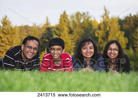 Family portrait in a park in autumn; Edmonton, Alberta, Canada View Large Photo Image Stock Photography - Family portrait in a park in autumn; Edmonton, Alberta, Canada. Fotosearch