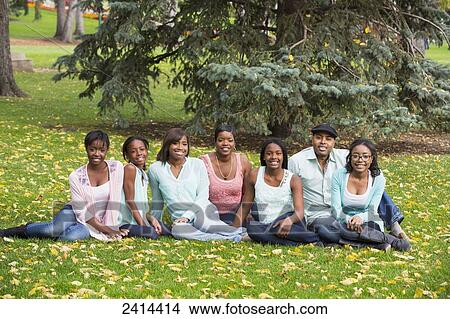 Family portrait with five daughters in a park in autumn; Edmonton, Albert, Canada View Large Photo Image Picture - Family portrait with five daughters in a park in autumn; Edmonton, Albert, Canada. Fotosearch