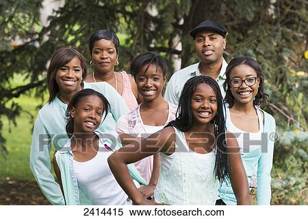 Family portrait with five daughters in a park in autumn; Edmonton, Albert, Canada View Large Photo Image Stock Photography - Family portrait with five daughters in a park in autumn; Edmonton, Albert, Canada. Fotosearch