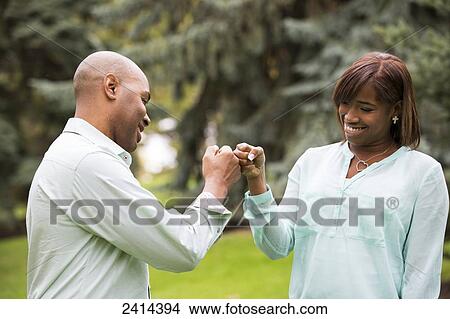 Father and daughter spending quality time together in a park; Edmonton, Alberta, Canada View Large Photo Image Picture - Father and daughter spending quality time together in a park; Edmonton, Alberta, Canada. Fotosearch