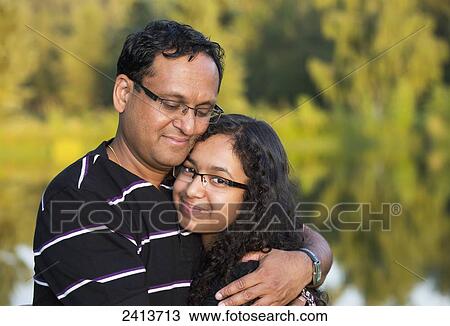 Father and daughter spending quality time together in a park; Edmonton, Alberta, Canada View Large Photo Image Stock Image - Father and daughter spending quality time together in a park; Edmonton, Alberta, Canada. Fotosearch