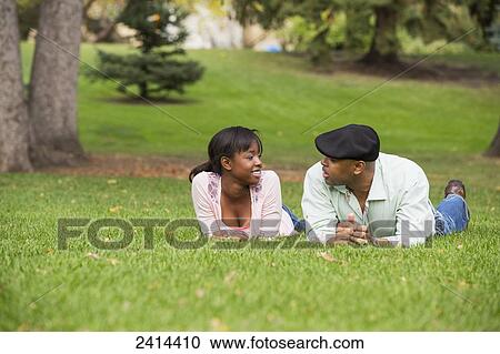 Father and daughter spending quality time together in a park; Edmonton, Alberta, Canada View Large Photo Image Stock Image - Father and daughter spending quality time together in a park; Edmonton, Alberta, Canada. Fotosearch