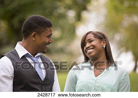 Father and daughter spending quality time together in a park; Edmonton, Alberta, Canada View Large Photo Image Stock Photo - Father and daughter spending quality time together in a park; Edmonton, Alberta, Canada. Fotosearch