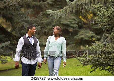 Father and daughter spending quality time together in a park; Edmonton, Alberta, Canada View Large Photo Image Stock Photo - Father and daughter spending quality time together in a park; Edmonton, Alberta, Canada. Fotosearch
