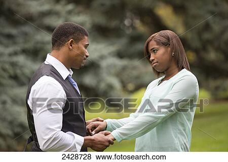 Father and daughter spending quality time together in a park; Edmonton, Alberta, Canada View Large Photo Image Stock Photo - Father and daughter spending quality time together in a park; Edmonton, Alberta, Canada. Fotosearch