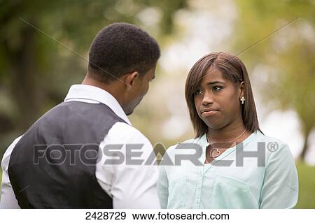 Father and daughter spending quality time together in a park; Edmonton, Alberta, Canada View Large Photo Image Stock Photo - Father and daughter spending quality time together in a park; Edmonton, Alberta, Canada. Fotosearch