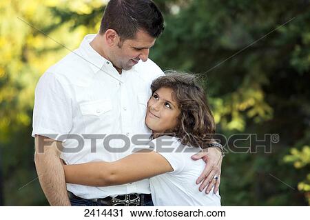 Father spending quality time with his daughter in a park; Edmonton, Alberta, Canada View Large Photo Image Stock Image - Father spending quality time with his daughter in a park; Edmonton, Alberta, Canada. Fotosearch