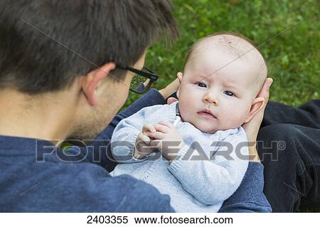 Father spending quality time with his infant daughter; Edmonton, Alberta, Canada View Large Photo Image Stock Photography - Father spending quality time with his infant daughter; Edmonton, Alberta, Canada. Fotosearch