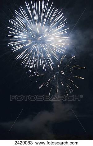 Stock Image - Fireworks display; Kenora, Ontario, Canada. Fotosearch