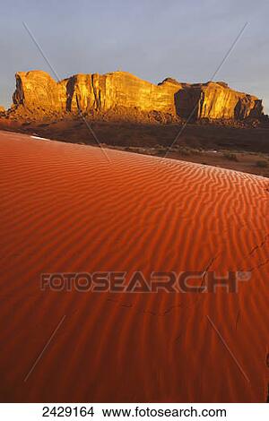 First light on sand dunes, Monument Valley Navajo Tribal Park; Arizona, United States of America View Large Photo Image Picture - First light on sand dunes, Monument Valley Navajo Tribal Park; Arizona, United States of America. Fotosearch