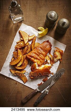 Fish and chips on a table View Large Photo Image Stock Photography - Fish and chips on a table. Fotosearch