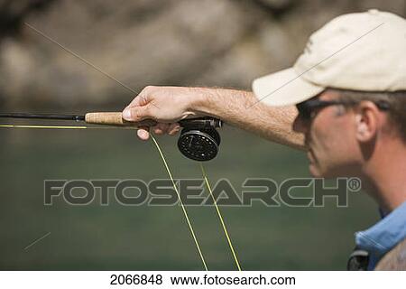 Fly-Fishing Guide, Russ Trand, Fly-Fishing On Tributary Of Elk River Near Fernie, Elk Valley, East Kootenays, British Columbia, Canada. View Large Photo Image Stock Photo - Fly-Fishing Guide, Russ Trand, Fly-Fishing On Tributary Of Elk River Near Fernie, Elk Valley, East Kootenays, British Columbia, Canada.. Fotosearch