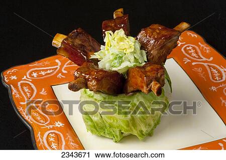 Food- Baby Back Ribs in a baby Iceberg lettuce head. Ingredients include pork ribs, Iceberg lettuce, BBQ sauce and ranch dressing. View Large Photo Image Stock Image - Food- Baby Back Ribs in a baby Iceberg lettuce head. Ingredients include pork ribs, Iceberg lettuce, BBQ sauce and ranch dressing.. Fotosearch