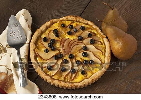Food - Pear Custard Pie topped with Bosc pear slices and blueberries. View Large Photo Image Stock Photo - Food - Pear Custard Pie topped with Bosc pear slices and blueberries.. Fotosearch