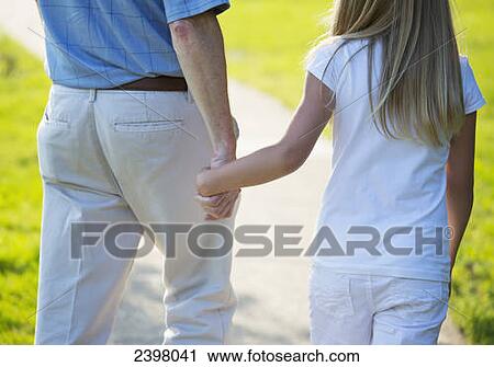 Grandfather and granddaughter spending quality time together in a park; Edmonton, Alberta, Canada View Large Photo Image Stock Image - Grandfather and granddaughter spending quality time together in a park; Edmonton, Alberta, Canada. Fotosearch