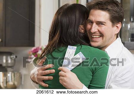 Stock Image - Green Gift Giving Can Include Giving Event Tickets Instead Of Material Goods, Winnipeg, Canada. Fotosearch