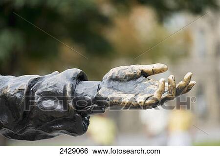 Hand on a statue reaching out; Ottawa, Ontario, Canada View Large Photo Image Stock Photograph - Hand on a statue reaching out; Ottawa, Ontario, Canada. Fotosearch