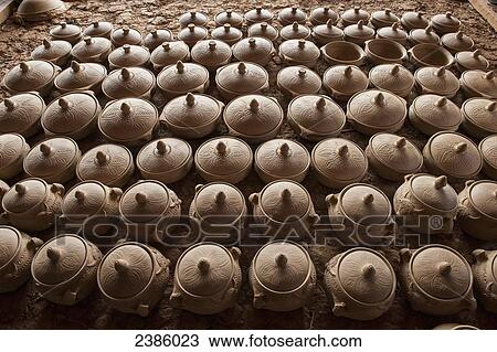 Handmade black pottery before firing; Zhongdian, Yunnan, China View Large Photo Image Stock Image - Handmade black pottery before firing; Zhongdian, Yunnan, China. Fotosearch