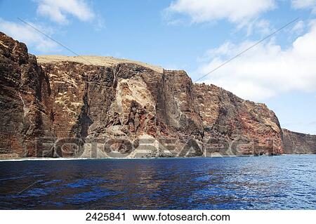 Stock Image - Hawaii, Lanai, A view of rugged sea cliffs. Fotosearch