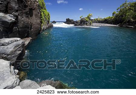 Hawaii, Maui, Hana, View of Venus Pool, Pacific Ocean in distance. View Large Photo Image Stock Image - Hawaii, Maui, Hana, View of Venus Pool, Pacific Ocean in distance.. Fotosearch