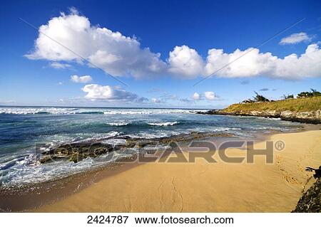 Stock Photo - Hawaii, Maui, Ho'okipa Beach Park, Maui's North shore and a small winter swell.. Fotosearch
