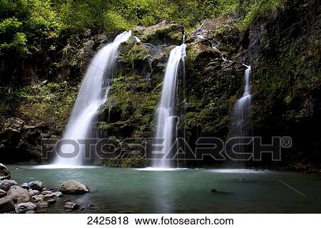 Hawaii, Maui, Waikani Falls and clear pond. View Large Photo Image Stock Photo - Hawaii, Maui, Waikani Falls and clear pond.. Fotosearch