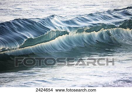 Hawaii, Oahu, Close up af a beautiful, blue, sunlit wave. View Large Photo Image Picture - Hawaii, Oahu, Close up af a beautiful, blue, sunlit wave.. Fotosearch