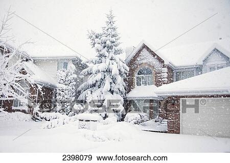 Heavy snowfall in a residential area; St. Albert, Alberta, Canada View Large Photo Image Stock Photo - Heavy snowfall in a residential area; St. Albert, Alberta, Canada. Fotosearch