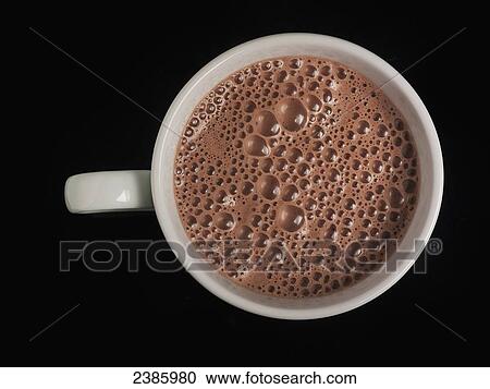 High angle view of hot chocolate in a white mug View Large Photo Image Stock Image - High angle view of hot chocolate in a white mug. Fotosearch