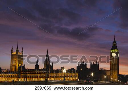 Stock Photo - Houses of Parliament at sunset with dramatic sky, Westminster; London, England. Fotosearch