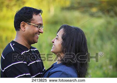 Husband and wife spending quality time together in a park; Edmonton, Alberta, Canada View Large Photo Image Stock Photography - Husband and wife spending quality time together in a park; Edmonton, Alberta, Canada. Fotosearch