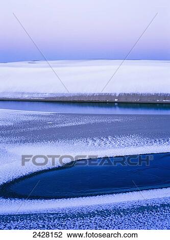 Ice and snow cover the dunes in winter; Lakeside, Oregon, United States of America View Large Photo Image Stock Image - Ice and snow cover the dunes in winter; Lakeside, Oregon, United States of America. Fotosearch