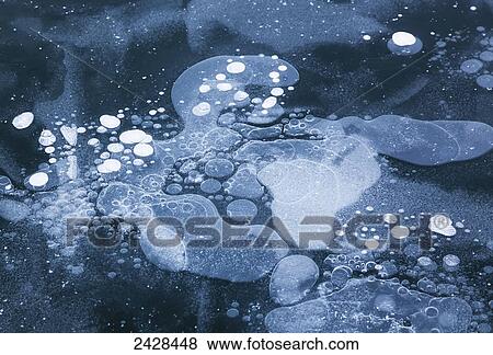 Ice creates patterns on the ocean water on a winter day in the Cowichan Valley on Vancouver Island; British Columbia, Canada View Large Photo Image Stock Photo - Ice creates patterns on the ocean water on a winter day in the Cowichan Valley on Vancouver Island; British Columbia, Canada. Fotosearch