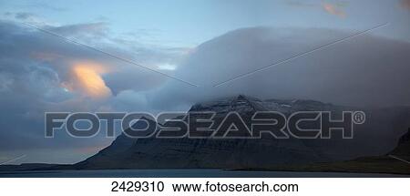 Stock Image - Icelandic topography showing the Atlantic Ocean taken from the number 1 highway in Southeast Iceland; Iceland. Fotosearch